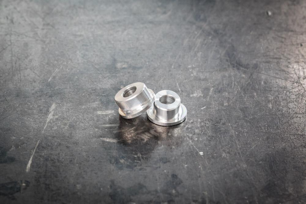 Oval Carrier Shifter Bushings (E36, E39, E46, Z3 early)-Shifter Components-Garagistic-Aluminum-Garagistic